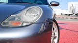 Used 2004 Porsche Boxster S Variant in Silver – Headlight Close-up for Sale at First Choice Cars Dubai Sharjah