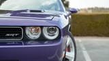 Used 2010 Dodge Challenger SRT8 Purple – Headlight Close-up at First Choice Cars Sharjah