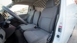Used 2022 Nissan Urvan Standard Roof White – Front Driver Side Cabin View at First Choice Cars Sharjah