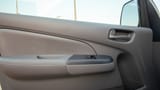 Used 2022 Nissan Urvan Standard Roof White – Driver Door Panel Full View at First Choice Cars Sharjah