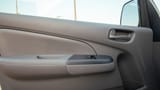 Used 2022 Nissan Urvan Standard Roof White – Driver Door Panel Full View at First Choice Cars Sharjah
