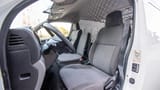 Used 2022 Nissan Urvan High Roof White – Front Driver Side Cabin View at First Choice Cars Sharjah