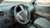 Used 2022 Nissan Sunny SV in White – Driver Side Dashboard & Steering View for Sale at First Choice Cars Dubai Sharjah