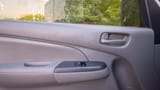 Used 2021 Nissan Urvan Standard Roof White – Driver Door Panel Full View at First Choice Cars Sharjah