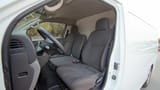 Used 2021 Nissan Urvan Standard Roof White – Front Driver Side Cabin View at First Choice Cars Sharjah