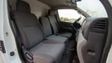 Used 2021 Nissan Urvan Standard Roof White – Front Passenger Side Cabin View at First Choice Cars Sharjah