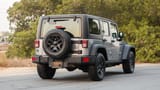Used 2018 Jeep Wrangler Unlimited Willys Wheeler in Silver – Right Back Diagonal (45°) View for Sale at First Choice Cars Dubai Sharjah