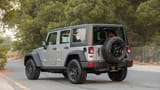 Used 2018 Jeep Wrangler Unlimited Willys Wheeler in Silver – Left Back Diagonal (45°) View for Sale at First Choice Cars Dubai Sharjah