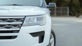 Used 2018 Ford Explorer XLT White – Headlight Close-up at First Choice Cars Sharjah