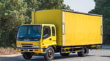 Used 2016 Isuzu FSR Cargo Body in Yellow – Left Front Diagonal (45°) View for Sale at First Choice Cars Dubai Sharjah