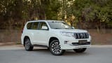 Used 2022 Toyota Prado GXR White – Right Front Diagonal (45°) View at First Choice Cars Sharjah