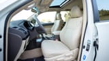 Used 2022 Toyota Prado GXR White – Front Driver Side Cabin View at First Choice Cars Sharjah