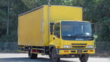 Used 2016 Isuzu FSR Cargo Body Yellow – Right Front Diagonal (45°) View at First Choice Cars Sharjah