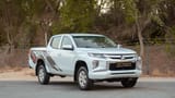 Used 2020 Mitsubishi L200 GLX Double Cabin White – Right Front Diagonal (45°) View at First Choice Cars Sharjah