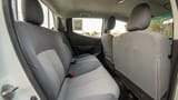 Used 2021 Mitsubishi L200 GL Double Cabin White – Rear Passenger Side Cabin View at First Choice Cars Sharjah
