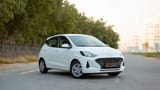 Used 2023 Hyundai Grand i10 Smart White – Right Front Diagonal (45°) View at First Choice Cars Sharjah