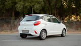 Used 2023 Hyundai Grand i10 Smart White – Right Back Diagonal (45°) View at First Choice Cars Sharjah