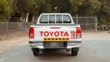 Used 2022 Toyota Hilux GLX Double Cabin White – Back/Rear View at First Choice Cars Sharjah