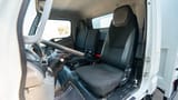 Used 2022 Mitsubishi Canter Cargo Body in White – Front Driver Side Cabin View for Sale at First Choice Cars Dubai Sharjah