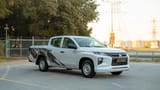Used 2020 Mitsubishi L200 GL Double Cabin White – Right Front Diagonal (45°) View at First Choice Cars Sharjah