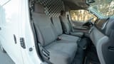 Used 2022 Nissan Urvan High Roof White – Front Passenger Side Cabin View at First Choice Cars Sharjah