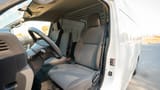 Used 2022 Nissan Urvan High Roof White – Front Driver Side Cabin View at First Choice Cars Sharjah