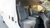 Used 2022 Nissan Urvan High Roof White – Front Passenger Side Cabin View at First Choice Cars Sharjah