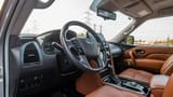 Used 2023 Infiniti QX80 Luxury Gold – Driver Side Dashboard & Steering View at First Choice Cars Sharjah
