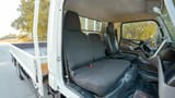 Used 2017 Mitsubishi Canter Cargo Body White – Front Passenger Side Cabin View at First Choice Cars Sharjah