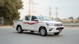 Used 2021 Toyota Hilux GLX Double Cabin White – Right Front Diagonal (45°) View at First Choice Cars Sharjah