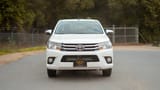 Used 2021 Toyota Hilux GLX Double Cabin White – Front View at First Choice Cars Sharjah