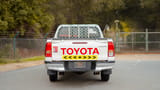 Used 2021 Toyota Hilux GLX Double Cabin White – Back/Rear View at First Choice Cars Sharjah