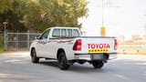 Used 2022 Toyota Hilux GLX Single Cabin White – Left Back Diagonal (45°) View at First Choice Cars Sharjah