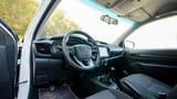 Used 2022 Toyota Hilux GLX Single Cabin White – Driver Side Dashboard & Steering View at First Choice Cars Sharjah
