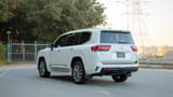 Used 2025 Toyota Land Cruiser VXR White – Left Back Diagonal (45°) View at First Choice Cars Sharjah