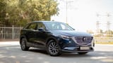 Used 2023 Mazda CX-9 GT in Blue – Right Front Diagonal (45°) View for Sale at First Choice Cars Dubai Sharjah