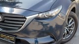 Used 2023 Mazda CX-9 GT in Blue – Headlight Close-up for Sale at First Choice Cars Dubai Sharjah