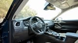 Used 2023 Mazda CX-9 GT in Blue – Driver Side Dashboard & Steering View for Sale at First Choice Cars Dubai Sharjah