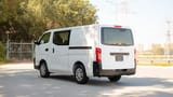 Used 2022 Nissan Urvan Standard Roof in White – Left Back Diagonal (45°) View for Sale at First Choice Cars Dubai Sharjah