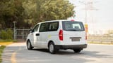 Used 2021 Hyundai H1 12-Seater Wagon in White – Left Back Diagonal (45°) View for Sale at First Choice Cars Dubai Sharjah