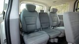 Used 2021 Hyundai H1 12-Seater Wagon in White – Third Row Right Seat View for Sale at First Choice Cars Dubai Sharjah
