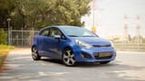 Used 2015 Kia Rio EX in Blue – Right Front Diagonal (45°) View for Sale at First Choice Cars Dubai Sharjah