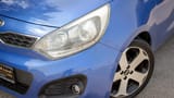 Used 2015 Kia Rio EX in Blue – Headlight Close-up for Sale at First Choice Cars Dubai Sharjah