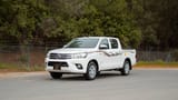 Used 2024 Toyota Hilux GL Double Cabin in White – Left Front Diagonal (45°) View for Sale at First Choice Cars Dubai Sharjah