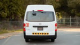 Used 2023 Nissan Urvan High Roof in White – Back/Rear View for Sale at First Choice Cars Dubai Sharjah