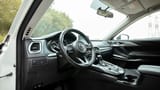 Used 2020 Mazda CX-9 GT in White – Driver Side Dashboard & Steering View for Sale at First Choice Cars Dubai Sharjah