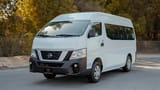 Used 2019 Nissan Urvan High Roof in White – Left Front Diagonal (45°) View for Sale at First Choice Cars Dubai Sharjah
