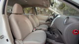 Used 2023 Nissan Sunny SV in White – Front Passenger Side Cabin View for Sale at First Choice Cars Dubai Sharjah