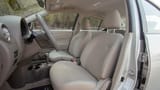 Used 2022 Nissan Sunny SV in Silver – Front Driver Side Cabin View for Sale at First Choice Cars Dubai Sharjah