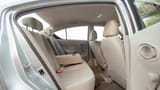Used 2022 Nissan Sunny SV in Silver – Rear Passenger Side Cabin View for Sale at First Choice Cars Dubai Sharjah